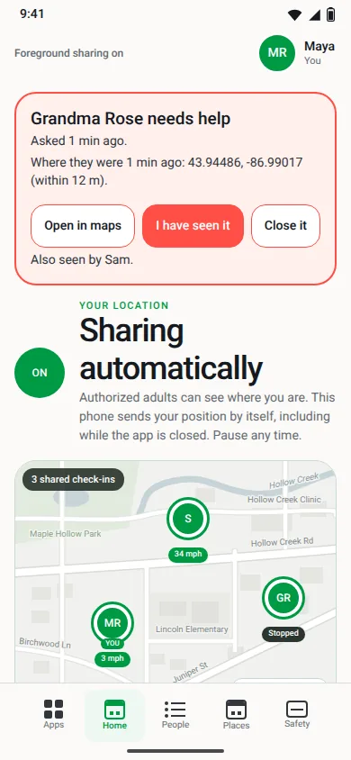 A family help alert on Maya's phone: Grandma Rose needs help, asked 1 minute ago, with where her phone was and buttons for Open in maps, I have seen it and Close it. It is a message to family, not an emergency call.